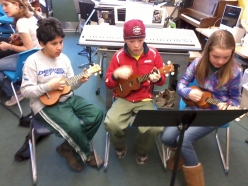 (from left to right), Bayron, Ben O., and me playing the Ukes.
